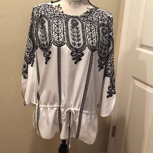 Blouse with peekaboo shoulder